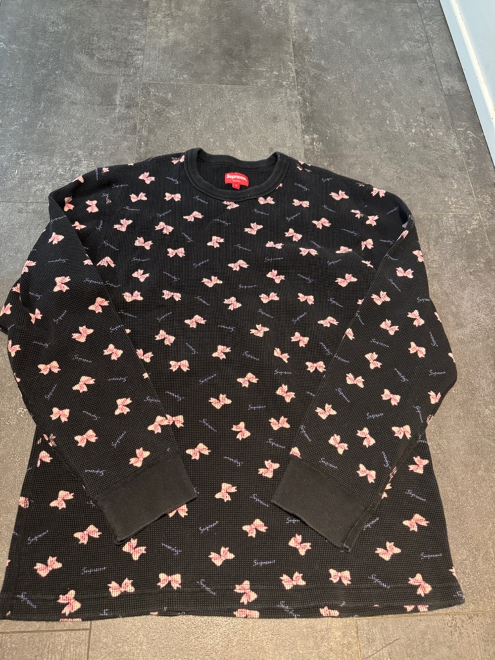 Authentic Supreme Black Crewneck Sweater with Pink Bow Print